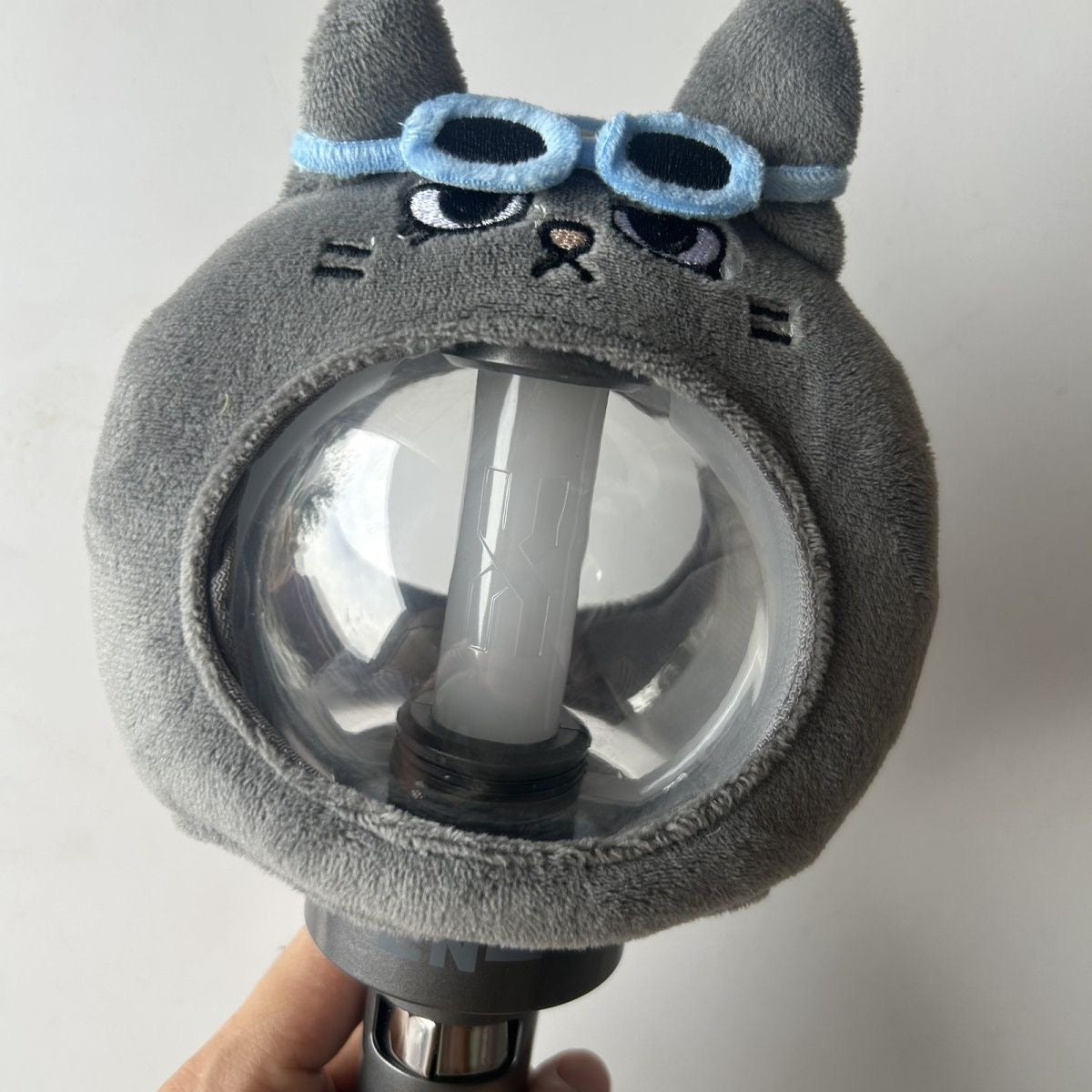 BOYNEXTDOOR member-inspired plush cover displayed on a light stick
