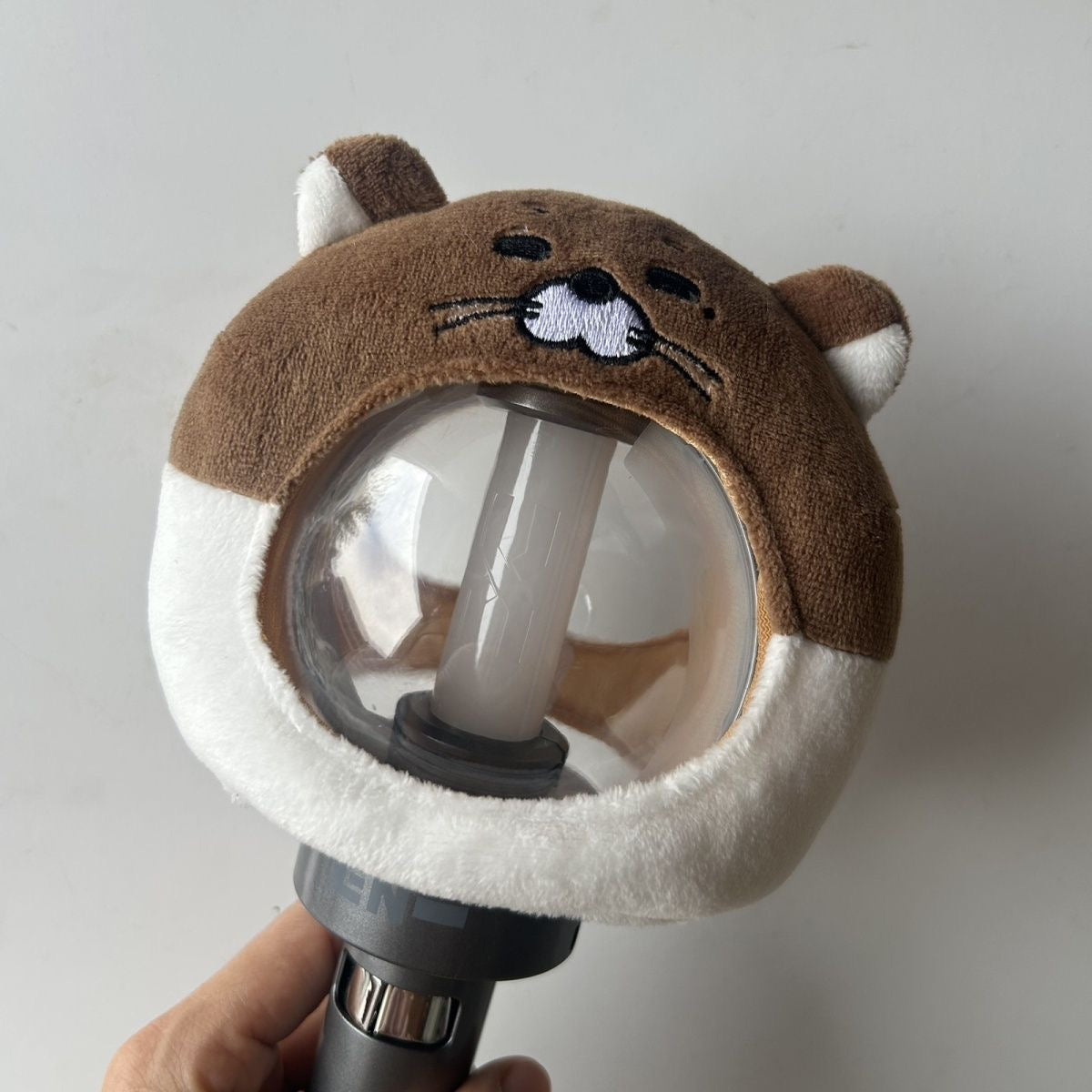 Front view of a BOYNEXTDOOR BBNEXDO plush light stick cover