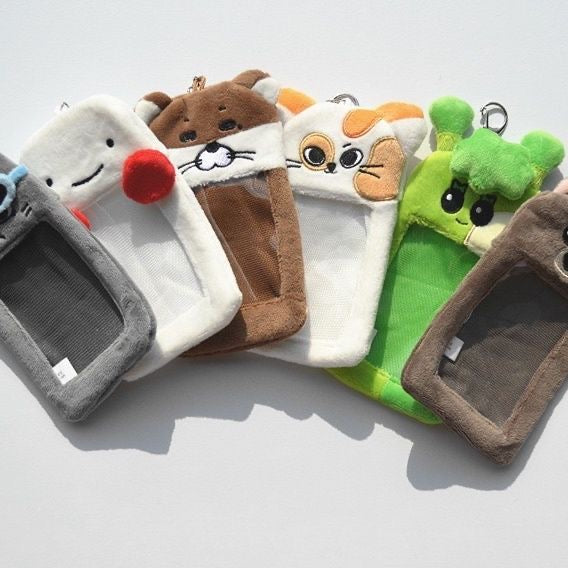 Close-up of a BOYNEXTDOOR BBNEXDO plush photocard holder
