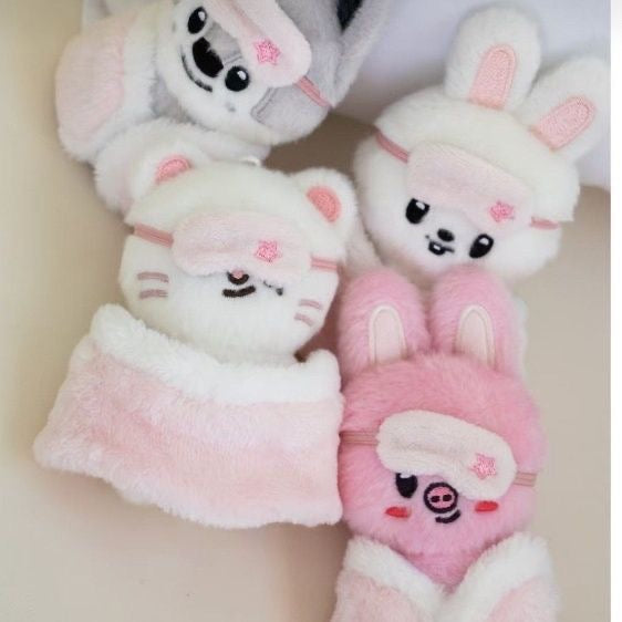SKZOO plush characters wearing soft pink-and-white pajamas
